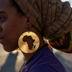 A protester wearing earrings with the image of the continent of Africa takes part in the International March Against the Genocide of Black People in Rio de Janeiro on Aug. 22, 2014.
YASUYOSHI CHIBA/AFP/Getty Images